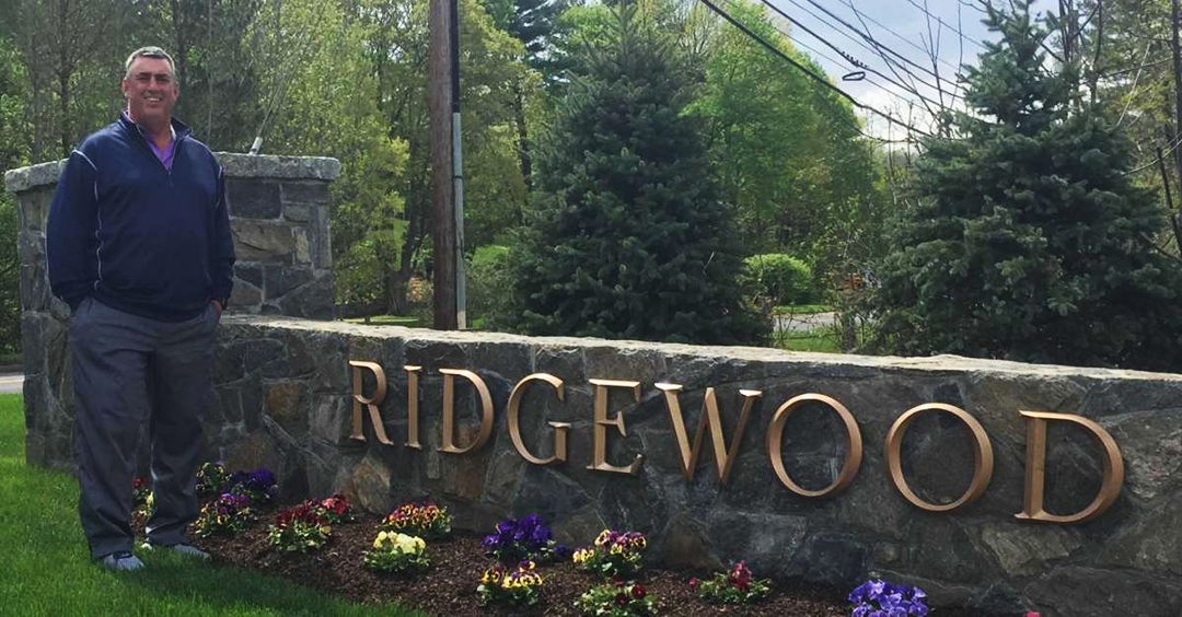 Bill Flood with Ridgewood Sign PNG